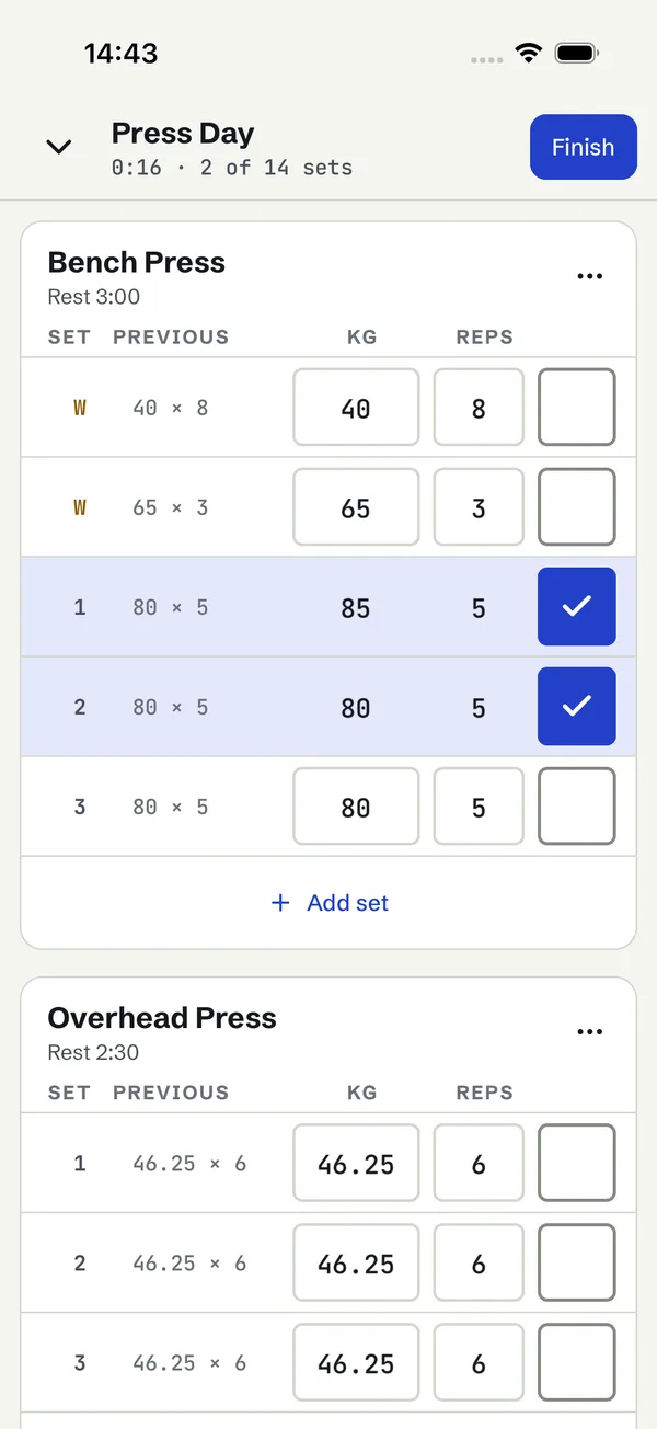 Workout in progress with completed bench press sets filled in blue